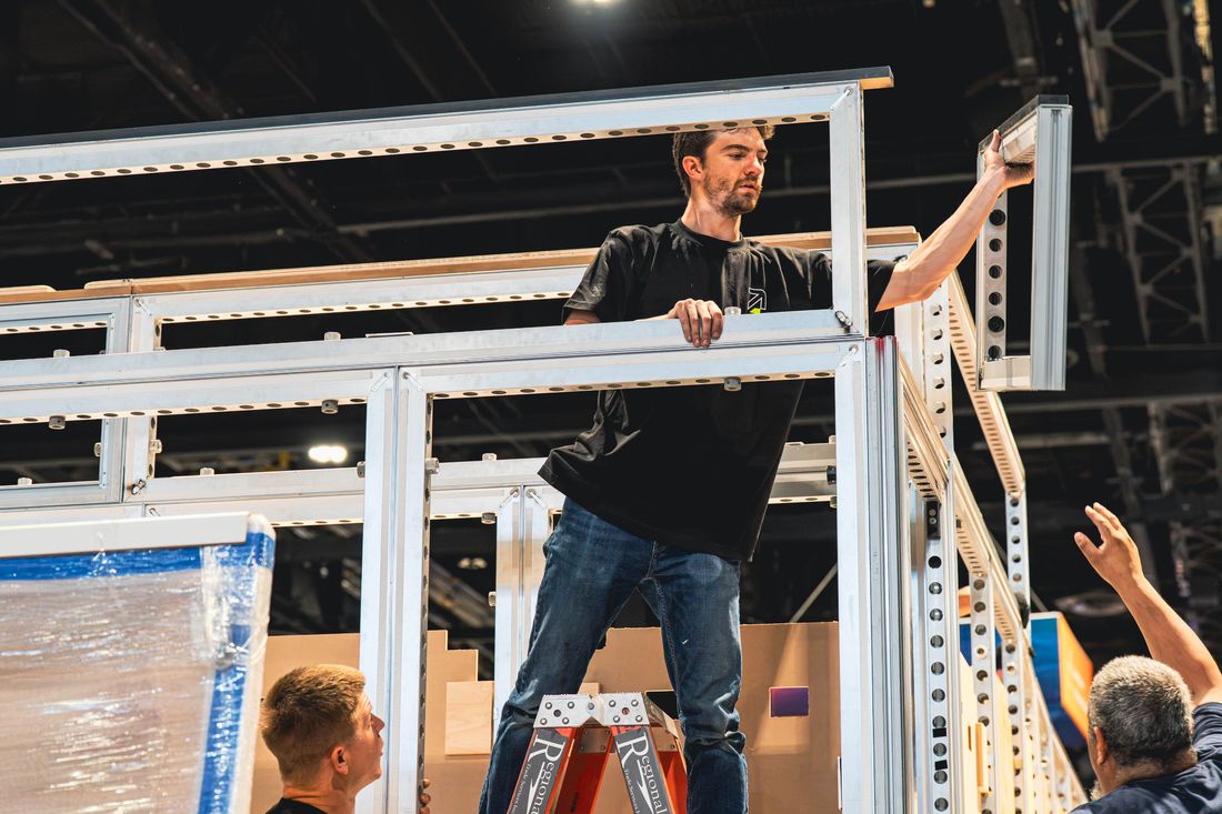 Crew installing an immersive activation set