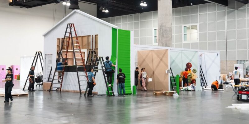 Miniature Seoul street set inside the Olive Young FESTA booth at KCON LA 2026