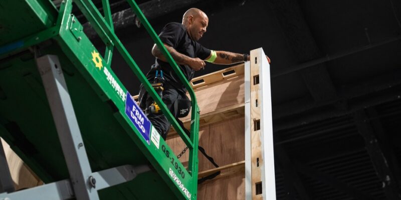 Overhead truss, lighting and LED wall installation on the Olive Young FESTA booth