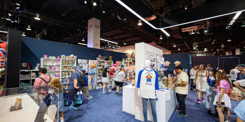 Merchandise store and fixtures inside the Disney+ and Hulu pavilion at D23 2026