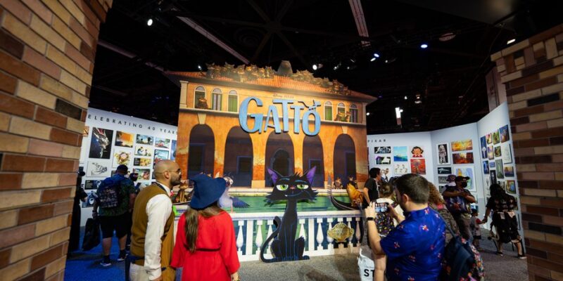 Themed brick facade set piece at the entrance to the Pixar pavilion at D23 2026